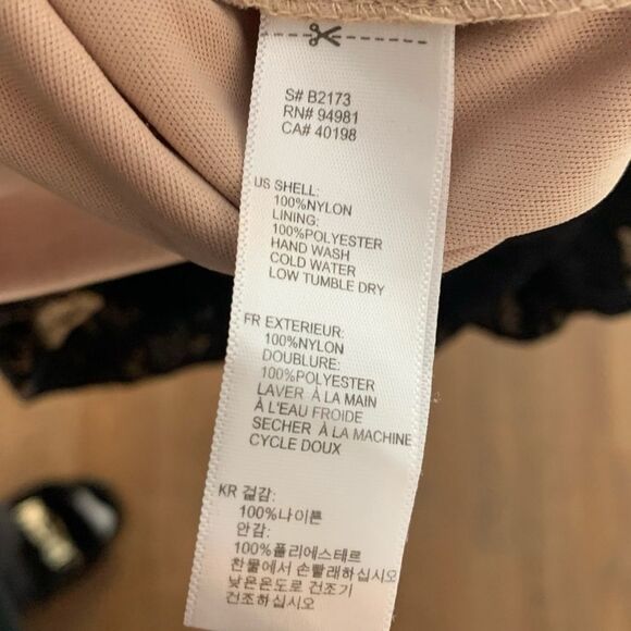 Twenty One black lace one-sleeved dress with sheer lace sleeve and tan liner - Picture 5 of 8